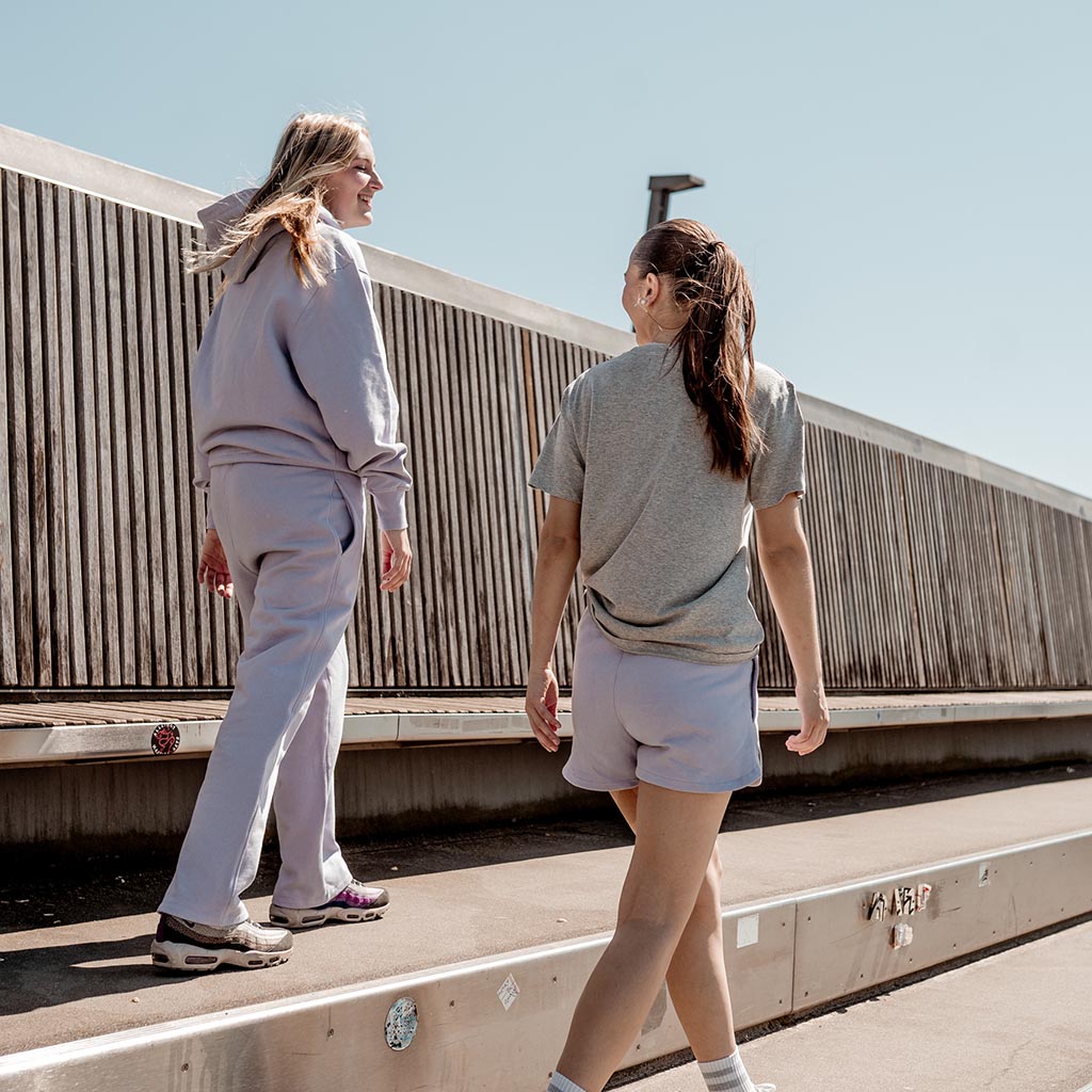 SOQA organic cotton tracksuit in lavender, featuring an oversized hoodie and wide-leg pants, made in Portugal.